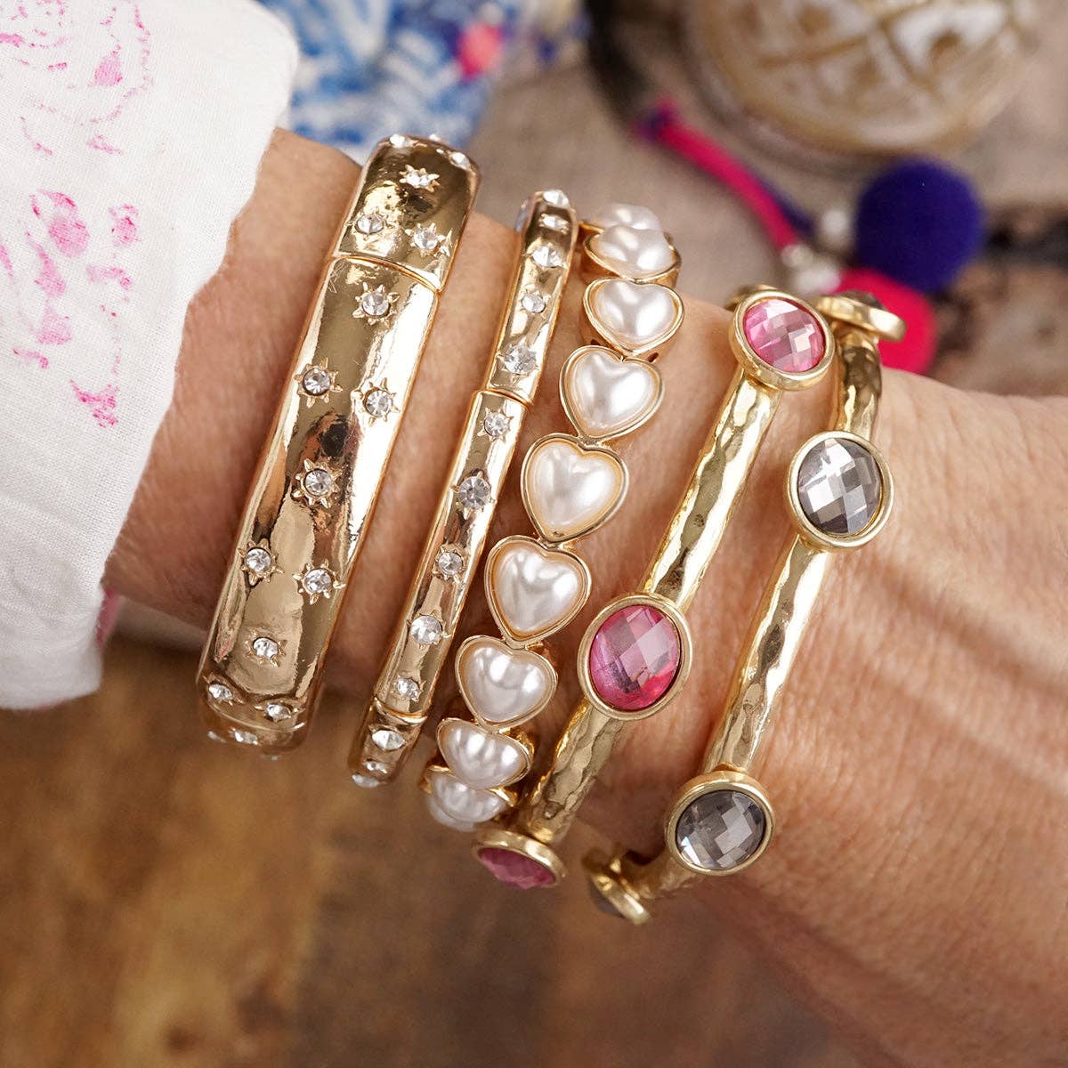 Jeweled Golden Bangle - with Faceted glass oval colorful jewels: Clear - Silver tone bangle