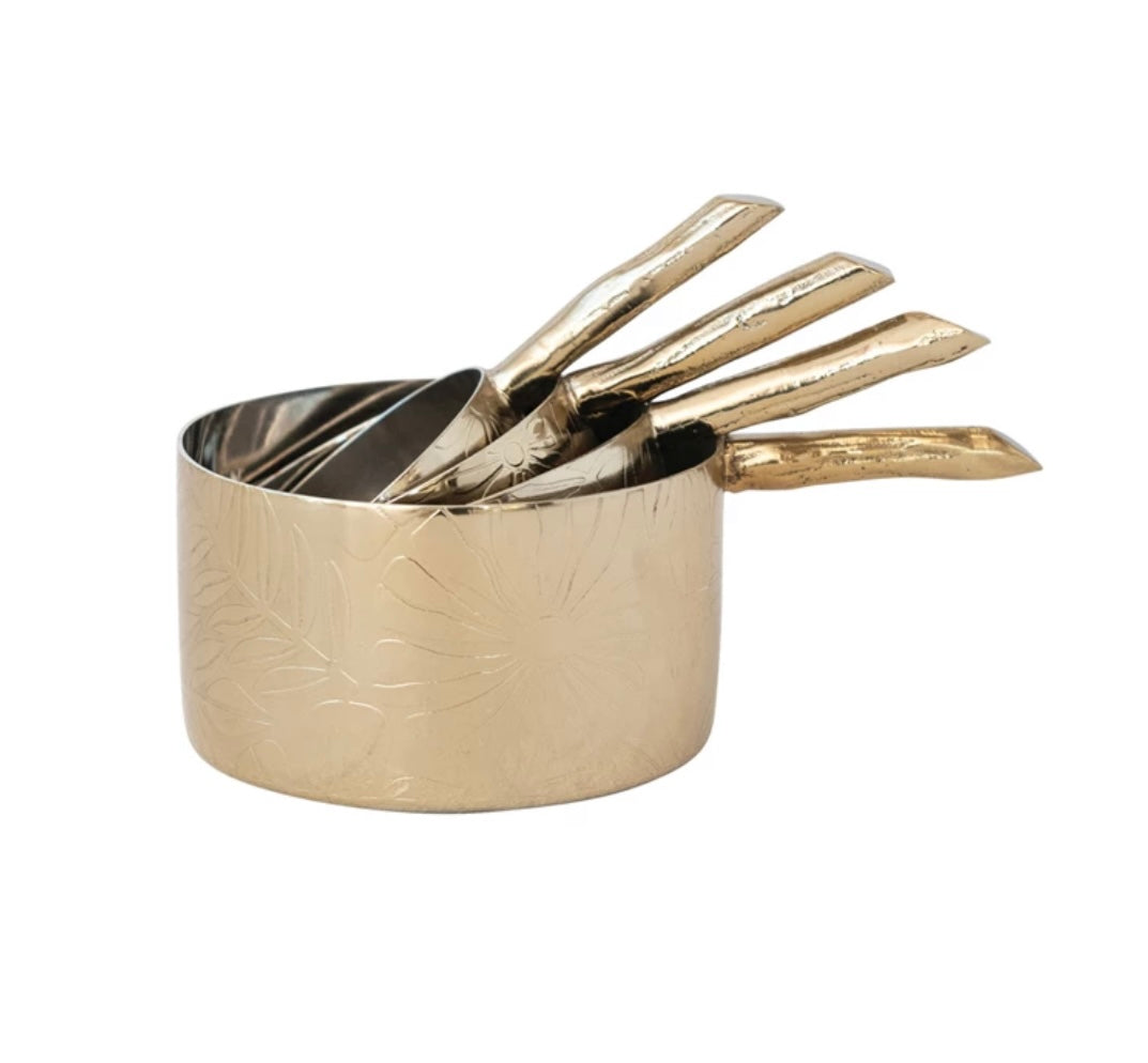 Stainless steel measuring cups with twig handles