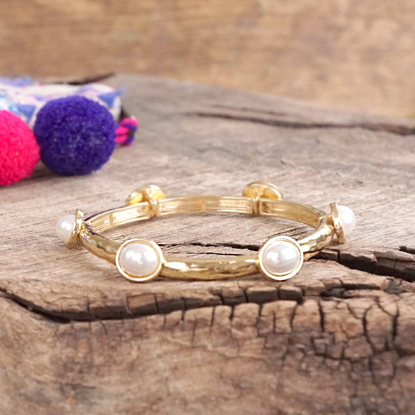 Jeweled Golden Bangle - with Faceted glass oval colorful jewels: Clear - Silver tone bangle