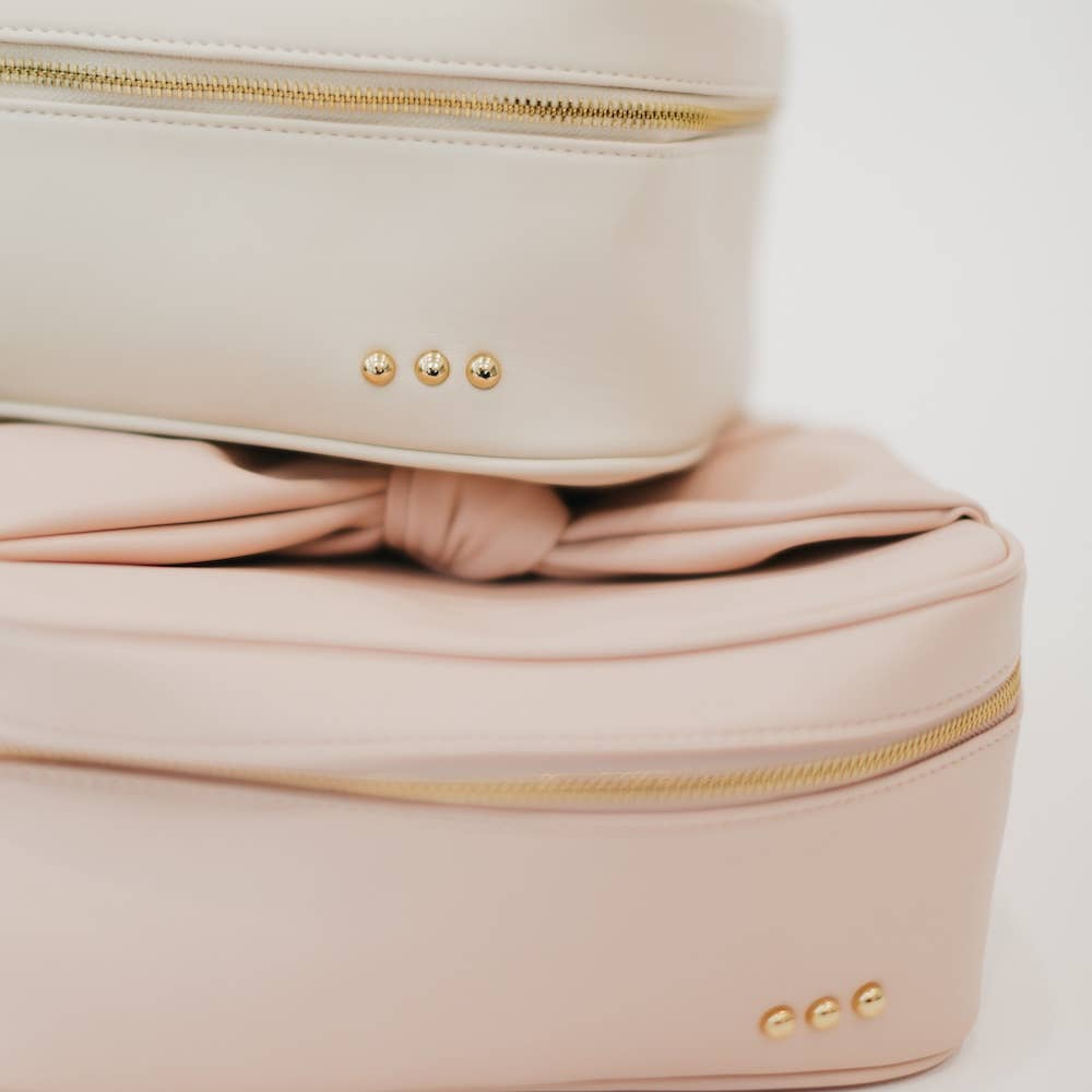 Madelyn Bow Makeup Bag: Cream