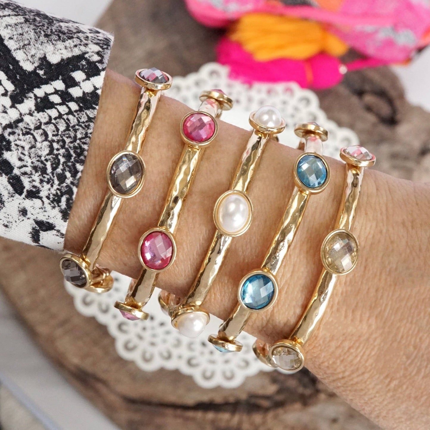 Jeweled Golden Bangle - with Faceted glass oval colorful jewels: Clear - Silver tone bangle