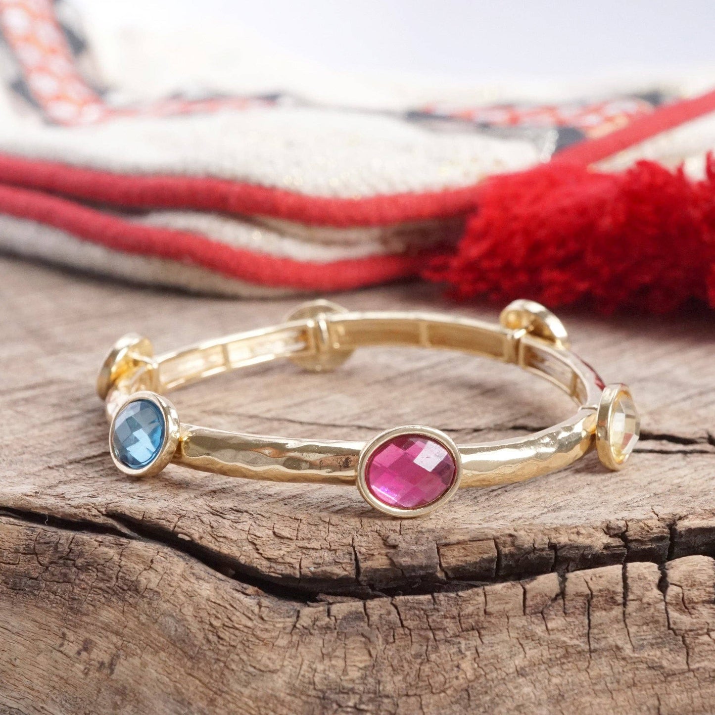 Jeweled Golden Bangle - with Faceted glass oval colorful jewels: Clear - Silver tone bangle